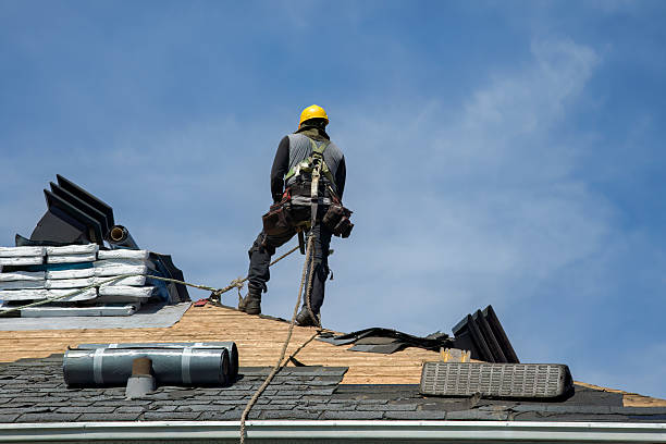 Professional Roof Replacement technician working in Oxford, FL